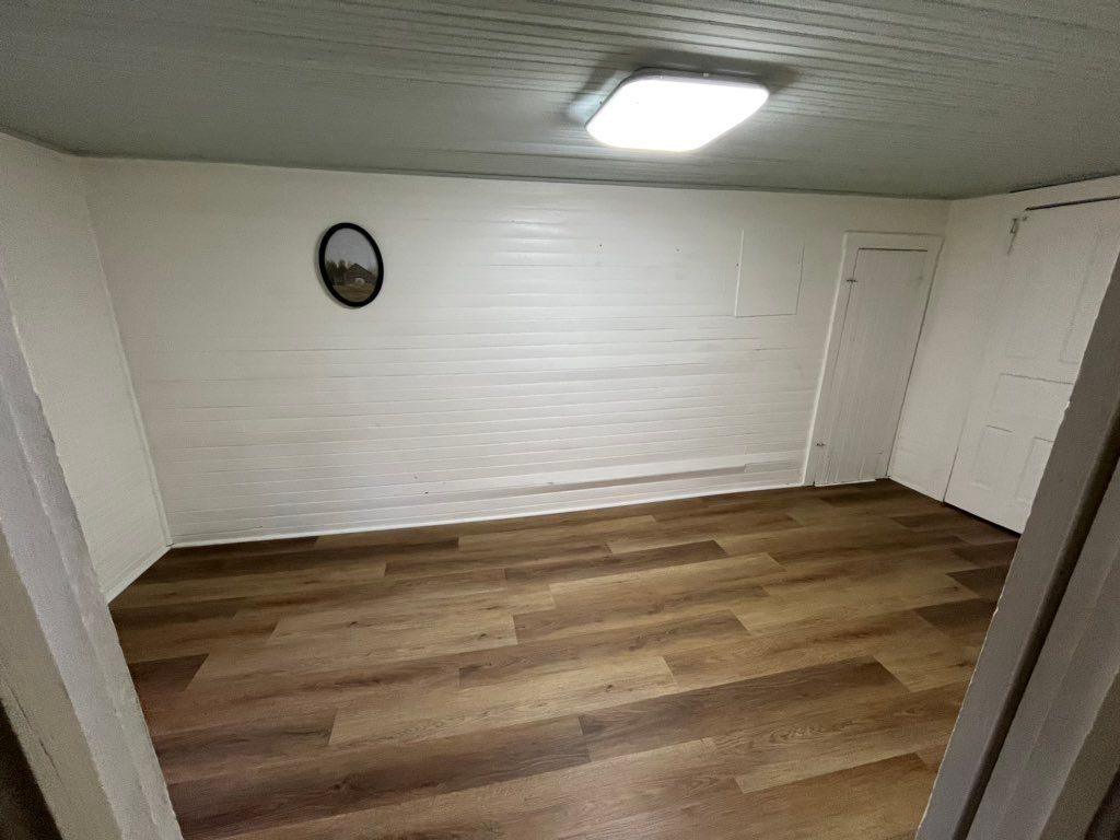 Basement after: rigid-core luxury vinyl plank